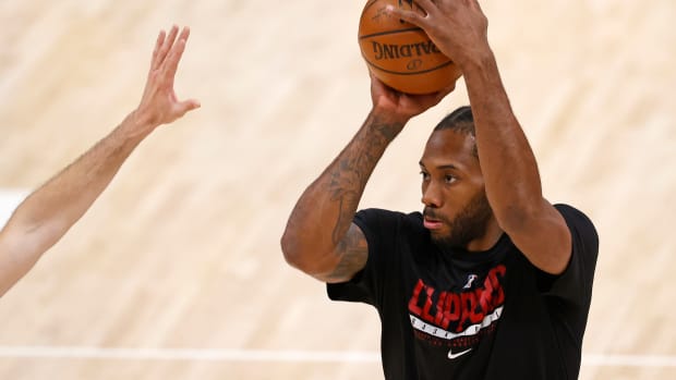 Jun 8, 2021; Salt Lake City, Utah, USA; LA Clippers forward Kawhi Leonard (2) warms up prior to game one in the second round of the 2021 NBA Playoffs. at Vivint Arena. Mandatory Credit: Jeffrey Swinger-USA TODAY Sports